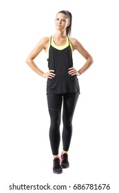 Satisfied Confident Active Healthy Woman In Sports Clothing With Hands On Hips. Full Body Length Portrait Isolated On White Background.