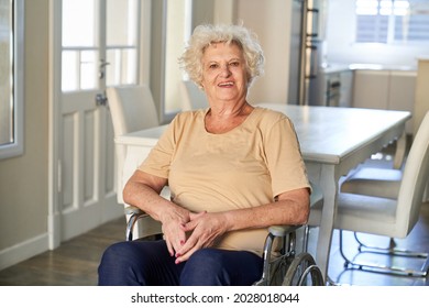 Satisfied Senior Citizen In A Wheelchair After A Stroke Or As An MS Patient In Her Home