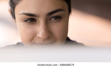 Satisfied Smiling Indian Employee Working At Computer Banner Close Up Face Portrait. Young Millennial Business Woman Sitting At Monitor, Looking At Display, Watching, Reading Content