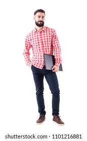 Satisfied Smiling Young Businessman Carrying Laptop Under The Arm Looking At Camera. Full Body Isolated On White Background.