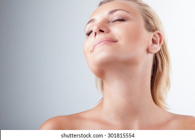 Satisfied Woman At Spa, Portrait Of Beautiful Female With Closed Eyes Of Pleasure Over Light Background, Natural Cosmetics, Enjoying Day At Spa Salon 