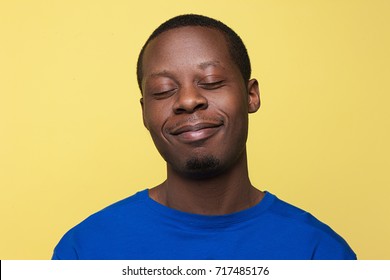 Satisfied Young Black Man Happy Mood Stock Photo (Edit Now) 717485176