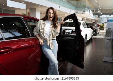 Satisfied Young Woman After She Was Approved For A Loan To Buy A New Car