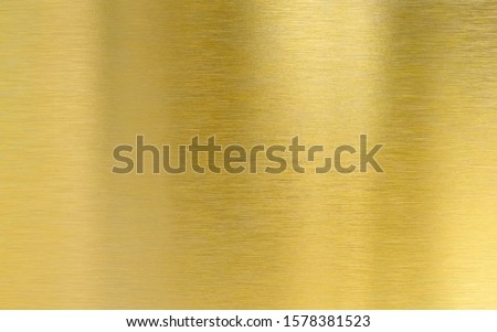 Saturated golden metal brushed texture plate