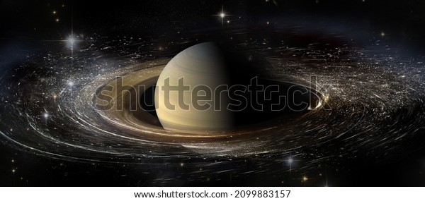 Saturn planet\
with rings in outer space among star dust and srars. Elements of\
this image furnished by\
NASA