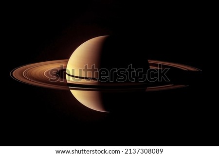Saturn with rings, on a dark background. Elements of this image furnished by NASA. High quality photo