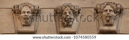Satyr (faun) face. Sculptures 18th century in old sity