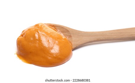 Sauce cocktail with brandy and fruity undertone in wooden spoon isolated on white - Shutterstock ID 2228680381