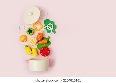 Saucepan With Soup Ingredients. Wooden Fruit And Vegetables Play Set. Game For Learning And Development Of The Child. Cute Kids Toys To Play In The Kitchen. Healthy Food Concept