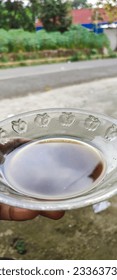saucer filled with Indonesian Robusta coffee in the countryside. coffee saucer
