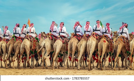 Saudi Arab Camel Riders With Their Camels On Traditional Desert Safari Festival In Abqaiq Saudi Arabia. 10-Jan-2020. 