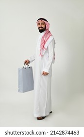 Saudi Arab Man Carrying Shopping Bags Happy Isolated On Solid White Background