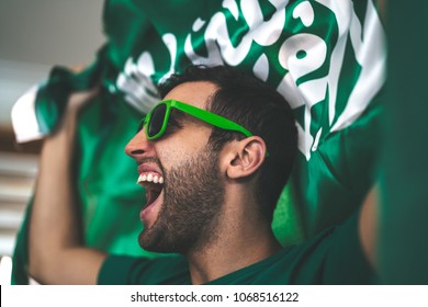 Saudi Arabia Fan Celebrating With Flag