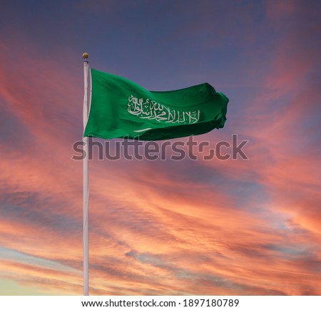 Saudi Arabia Flag In Beautiful Blue Sky
