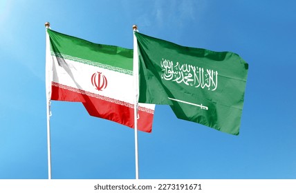Saudi Arabia flag and Iran flag on cloudy sky. waving in the sky - Shutterstock ID 2273191671