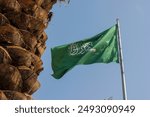 Saudi Arabia flag in Riyadh downtown, the text on the flag in Arabic says: "There is no deity but God; Muhammad is the Messenger of God" , Saudi Arabia, 2023