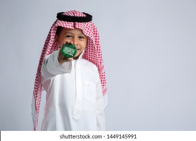 Saudi Boy Celebrating National Day