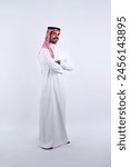 Saudi man standing side view isolated on white background 