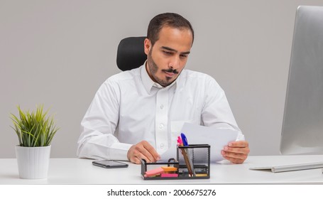 A Saudi Man Working In The Office