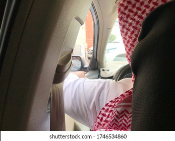 Saudi men waiting in his car. - Shutterstock ID 1746534860