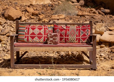 Saudi Traditional Sadu Couch Against Desert Mountain in "Al Ola" Al Ula, Saudi Arabia. Al Ola is Part of Madinah Province in Western Saudi Arabia