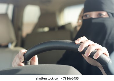 Saudi Woman Driving a Car in Saudi Arabia