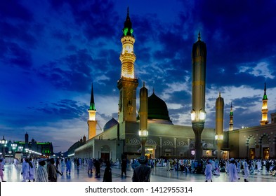 SaudiArabia,Madina-27/05/2019:Masjid Nabwi In Blue Sky With Dark Clouds  Background Madina Munawara,saudi Arabaia. 