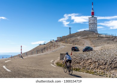 Sault, Provence, France - October 3, 2018: Tourist Cycling Bike On Slope Hill To The Top Of Mont Serein Ventoux.