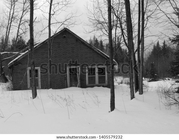 Sault ste. Marie, Ontario, Canada\
Abandon house in\
a rural area of the city. Winter time. Story goes the old man was\
found deceased inside. Behind the house is a multitude of old\
rusted cars.
