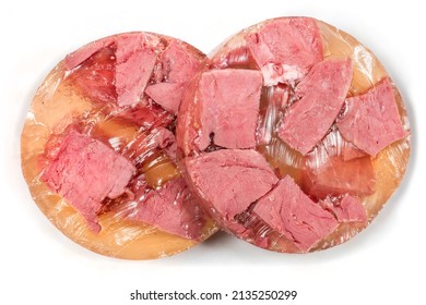 Sausage aspic tongue on a white background. Sausages close-up.