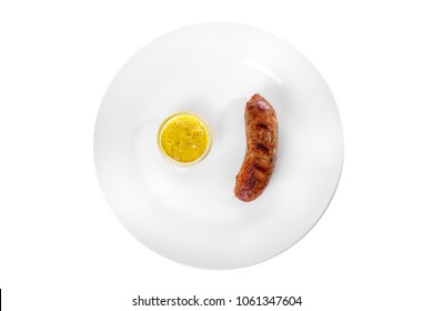 Sausage, beef, lamb, skinnut, grilled meat, barbecue, without garnish on a plate, isolated on white background. Mustard, yellow sauce. For the menu in the restaurant, bar. View from above