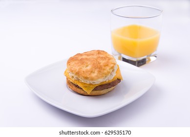 Sausage Biscuit And Orange Juice
