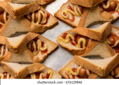 Sausage Bread With Mayo Sauce On Bakery Tray.