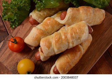 Sausage Buns. Soft Baked Bun (dough )stuffed With Pork Sausage For Fast Food Breakfast Or Coffee Break. Sausage  Roll, (hot Dog).