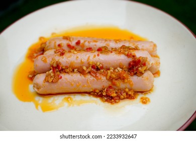 Sausage with chili sauce. Sosis dengan sambal, indonesian food.  - Shutterstock ID 2233932647