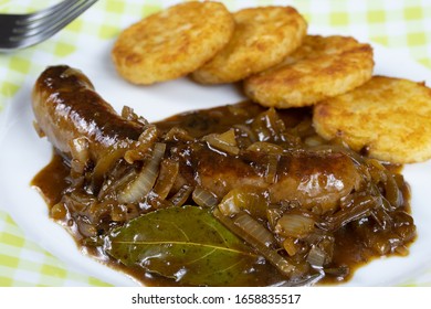 Sausage Cooked With Onions And Rösti