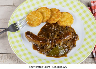 Sausage Cooked With Onions And Rösti