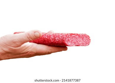 Sausage In The Hand Of A Middle-aged Woman. The Concept Of The World Food Crisis Associated With The War In Ukraine. Isolated On White Background.