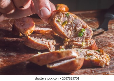 Sausage With Jalapeno Pepper And Cheddar On A Wooden Board, Copy Space And Selective Focus