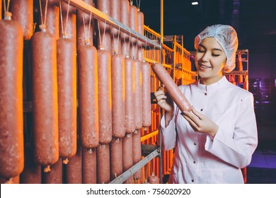 sausage meat factory production worker manufactre female - Powered by Shutterstock