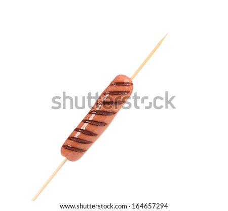 Sausage roll grilled on stick. Isolated on a white background.