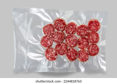 Sausage salami slices in vacuum packed sealed for sous vide cooking isolated on Gray background in top view - Powered by Shutterstock