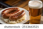 Sausages with cabbage and beer. Traditional pub dishes.