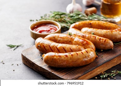 Sausages fried with spices and herbs, Selective focus