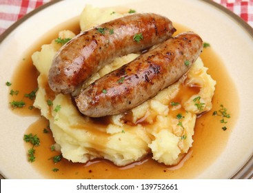 Sausages and mashed potato and gravy.