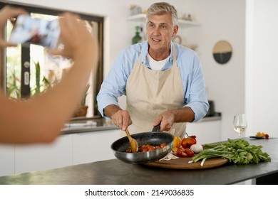 Saut Sorted. Shot Of A Mature Man Cooking.