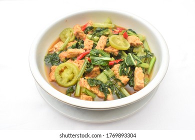 Sauteed Mustard Greens And Tempeh. Homemade Healthy Food.