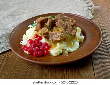 Sauteed Reindeer Venison Steak Served With Mashed Potatoes And Lingonberry  -   Traditional Meal From Lapland, Especially In Finland, Sweden, Norway And Russia.