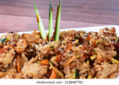 Sauteed Wok Rice, Accompanied By Beef Tenderloin, Vegetables, Chicken, Sesame, Soy Sauce And Teriyaki