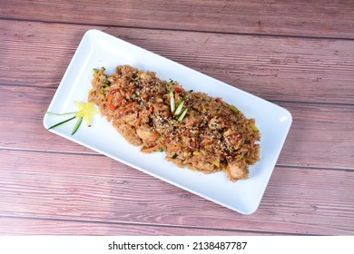 Sauteed Wok Rice, Accompanied By Beef Tenderloin, Vegetables, Chicken, Sesame, Soy Sauce And Teriyaki